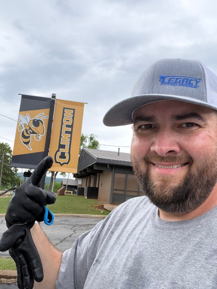 Seth Bartolotta, owner of Legacy Pressure Washing, on a school job in Clinton
